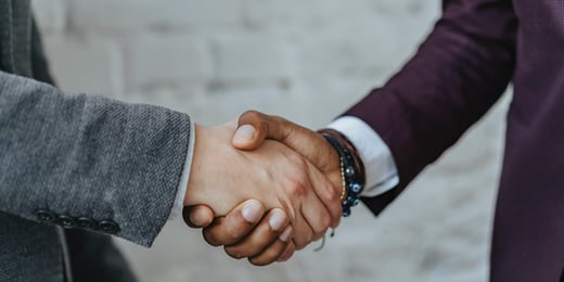 partner-vs-vendor-handshake